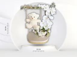 Stand with flowers and teddy bear